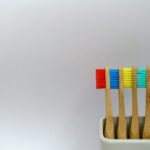 four assorted-color toothbrushes